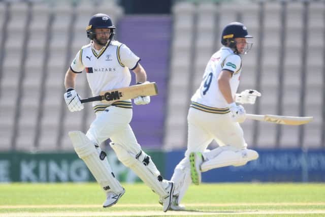 Yorkshire's Adam Lyth, left, and Gary Ballance of Yorkshire run a single against Hampshire at the Ageas Bowl. Picture: Mike Hewitt/Getty Images