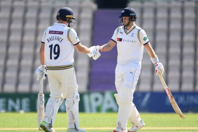 Gary Ballance is congratulated by Joe Root on reaching his half century against Hampshire at The Ageas Bowl. Picture: Mike Hewitt/Getty Images)