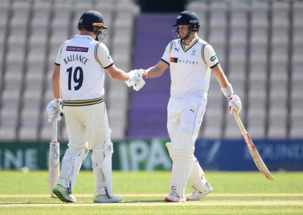 Gary Ballance is congratulated by Yorkshire team-mate Joe Root after reaching his half-century against Hampshire at Ageas Bowl. Ballance was 120no at the close (Picture: Mike Hewitt/Getty Images).