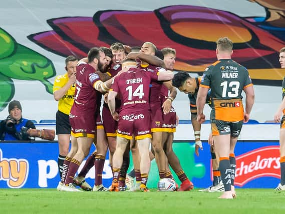 Huddersfield Giants' Alex Mellor celebrates one of his hat-trick of tries.
