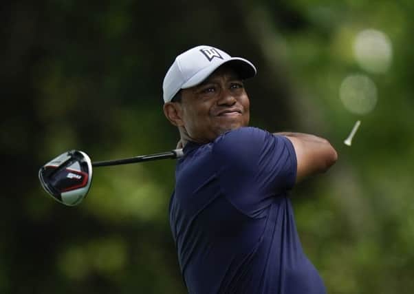 Tiger Woods hits his drive on the second hole during the first round of the Masters (Picture: David J Phillip/AP).