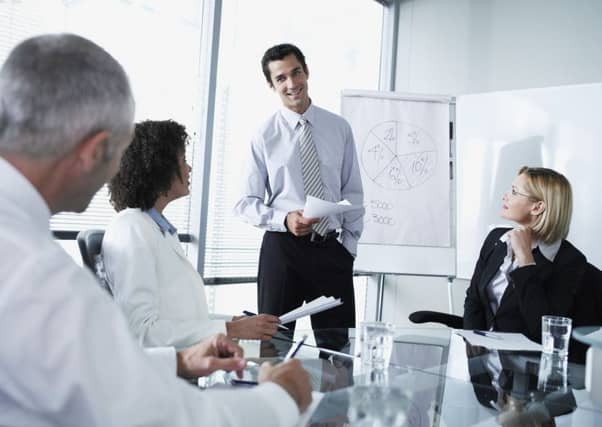 Mandatory Credit: Photo by OJO Images / Rex Features ( 822444a ) MODEL RELEASED Group of office workers in a boardroom presentation VARIOUS