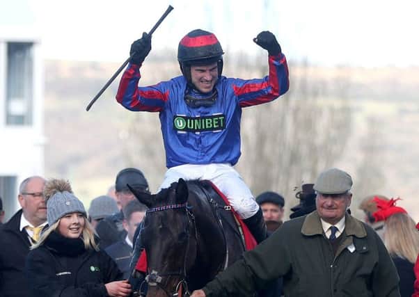 Jockey Jerry McGrath celebrates winning the Ultima Handicap Chase on Beware The Bear during Champion Day of the 2019 Cheltenham Festival at Cheltenham Racecourse (Picture: Simon Cooper/PA Wire)