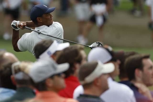 Tiger Woods hits a drive on the third hole during the second round for the Masters golf tournament Friday, April 12, 2019. (AP Photo/Matt Slocum)