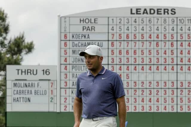 Italy's Francesco Molinari walks off the 17th green during his second round at the 2019 Masters (Picture: Charlie Riedel/AP).