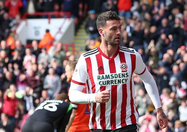 On taerget: Gary Madine after his goal for  Sheffield United.