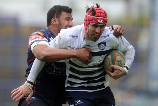 Yorkshire Carnegie's Carnegie Dan Temm tackled by Knights' Josh Tyrell. (Picture:Tony Johnson)
