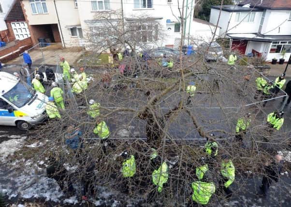 Police at one of Sheffield's tree felling sites last year.