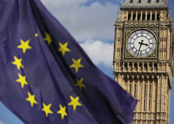 A European Union flag in front of Big Ben, as Remain supporters demonstrate in Parliament Square, London, to show their support for the EU in the wake of Brexit.