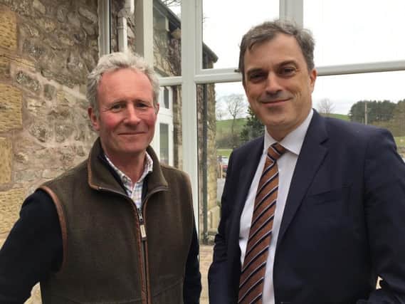 Skipton and Ripon MP Julian Smith (right) held talks over the proposed closure of Clapham C of E Primary School with Philip Farrer (left), resident trustee of the Ingleborough Estate. Picture courtesy of Clapham Community Action Group.