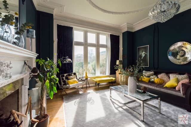 The large rooms and period features in Amy's home appeal to photographers