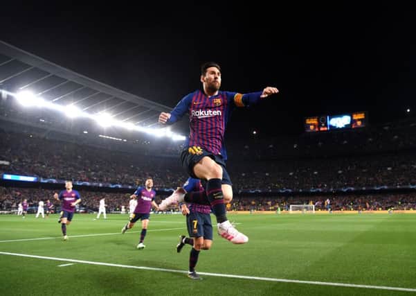 TAKE THAT: Lionel Messi of Barcelona celebrates after scoring his teams first goal during last nights Champions League quarter-final second leg match against Manchester United at the Nou Camp, the hosts winning 3-0 on the night and 4-0 on aggregate. Picture:  Michael Regan/Getty Images.