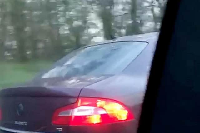 The reckless driving was caught on camera by a passenger in the next car along. Photos: SWNS