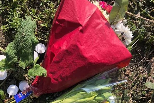 Tributes for Alena at the scene where her body was discovered.