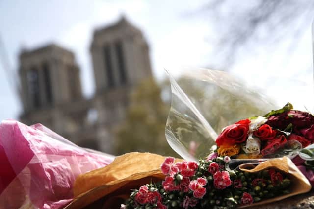 A floral tribute left by a worshipper in the vicinity of the Notre-Dame cathedral.