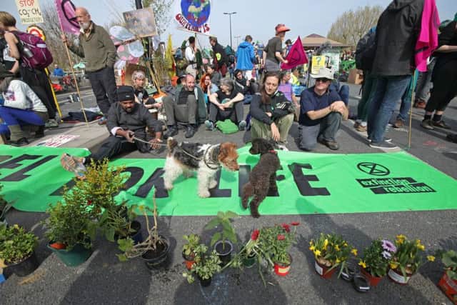 Extinction Rebellion demonstrators on Waterloo Bridge, London, as commuters faced a fourth day of disruption.