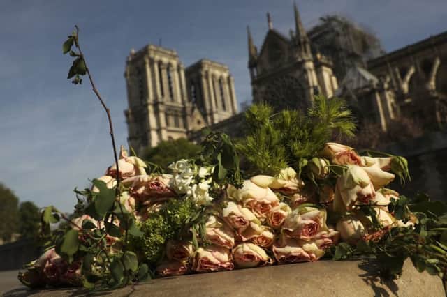 A bunch of flowers place near the Notre-Dame cathedral in France.