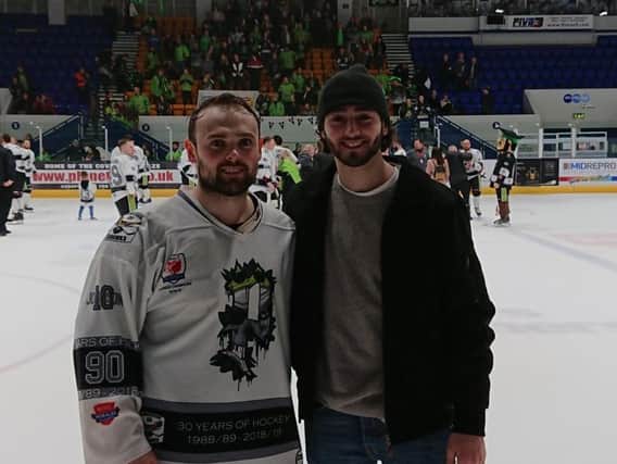 Jonathan Kirk, pictured with brother Liam after winning the NIHL National play-off title in Coventry.