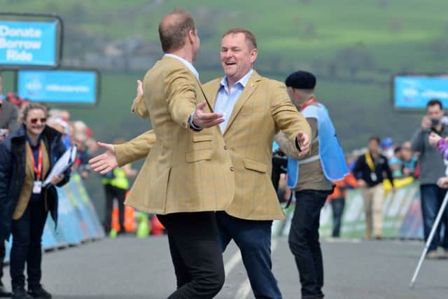 Tour de France director Christian Prudhomme (left) and Sir Gary Verity, the then Welcome to Yorkshire chief executive, on last year's Tour de Yorkshire finish line in Ilkley.