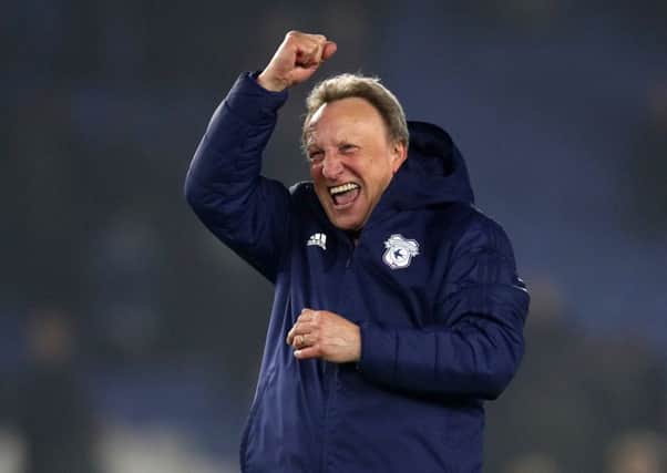 Cardiff City manager Neil Warnock: Celebrating victory against Brighton.