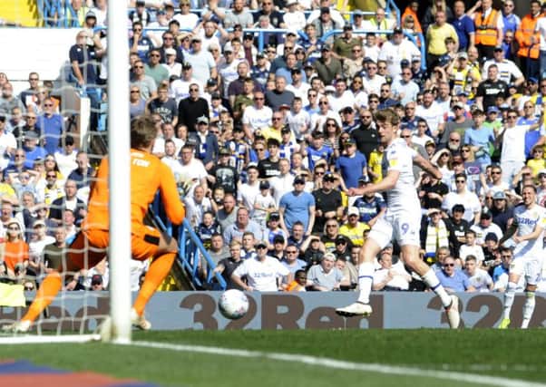 TAKE THAT: Patrick Bamford scores the opening goal for Leeds United. Picture: Simon Hulme