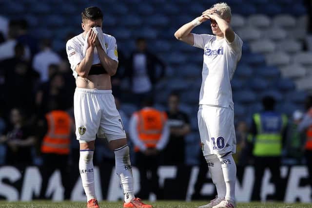 Leeds United's Pablo Hernandez (left) and Ezgjan Alioski (right) show their dejection at Elland Road. Picture: Martin Rickett/PA