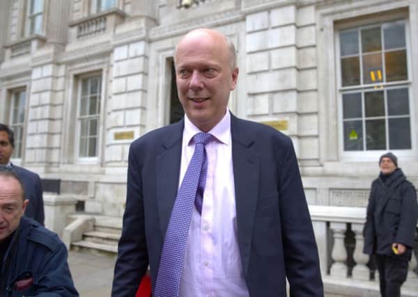 Transport Secretary Chris Grayling is micro-managing policy on road signs.