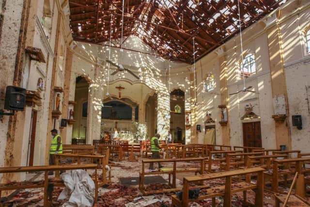 A view of St. Sebastian's Church damaged in blast in Negombo, north of Colombo, Sri Lanka, Sunday, April 21, 2019.