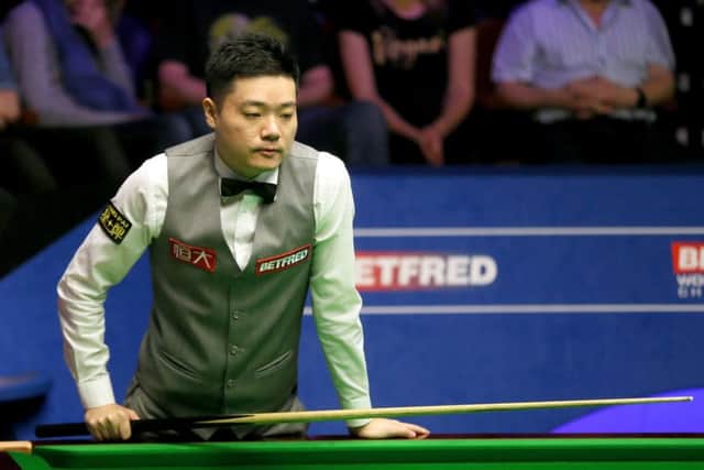 Ding Junhui eased past Scotland's Anthony McGill at The Crucible. Picture: Richard Sellers/PA