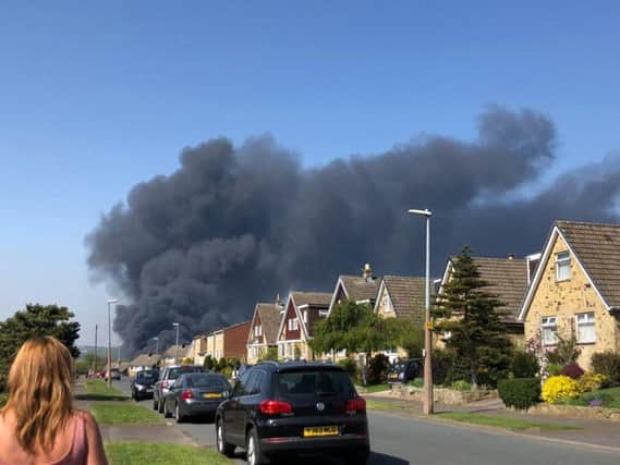 Thick black smoke rising from the fire at Cooper Bridge (Photo: @james_h00I)