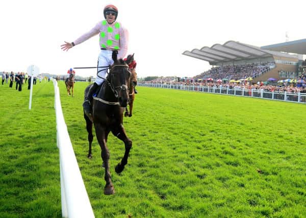Burrows Saint crosses the line in the Irish Grand National under Ruby Walsh.