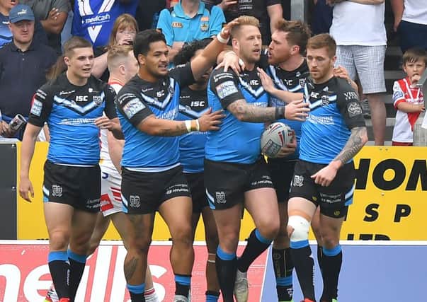 Hull FC's Joe Westerman is congratulated on scoring his team's opening try.
