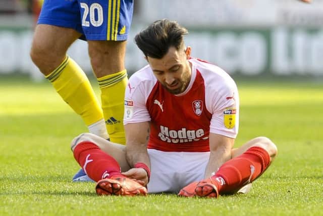 Rotherham United's Richie Towell sits dejected after the 3-1 defeat to Birmingham City (Picture: Dean Atkins).