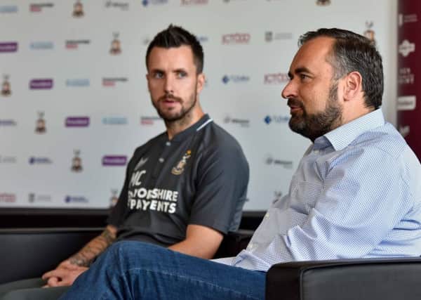 Hasty appointment: Bradford City's Michael Collins, left, and  Edin Rahic.
