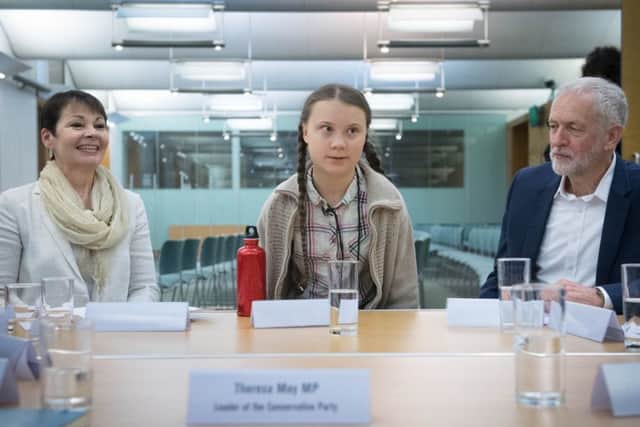 Swedish climate acticist Greta Thunberg meets leaders of the UK political parties at the House of Commons in Westminster, London including Green Party leader Caroline Lucas (left) and Labour leader Jeremy Corbyn (right), a chair was reserved for Theresa May, to discuss the need for cross-party action to address the climate crisis.
