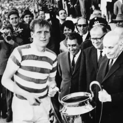 30th May 1967:  Billy McNeill of Celtic receives the European Cup trophy from the President of Portugal after the Scottish side's 2-1 victory over Inter Milan in Lisbon in the European Cup final. Tommy Gemmell and Stevie Chalmers scored for Celtic which ensured a surprise 2-1 victory for the Scottish team. Celtic became the first British side to win the trophy and remain the only Scottish side to reach the final.  (Photo by Central Press/Getty Images)