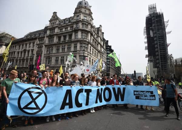 Extinction Rebellion protesters outside the Houses of Parliament.