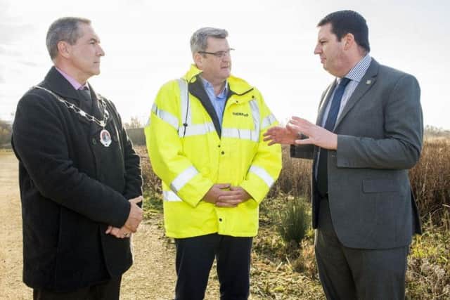 Finbarr Dowling, Project Director, shows Andrew Percy MP and the Mayor of Goole, Cllr Richard Walker, around the development site at Goole