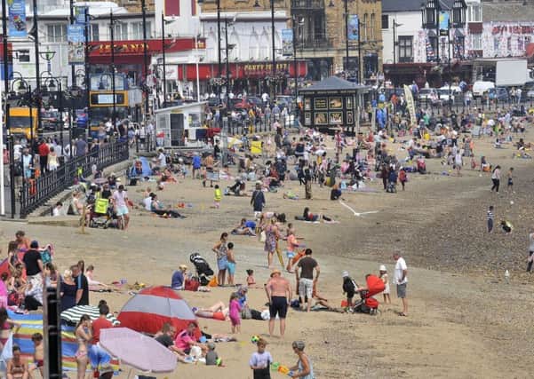 A scorching hot day down on Scarborough's South Bay Beach . . pic Richard Ponter 185007b