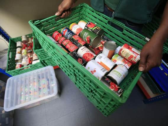 The main reasons for people turning to a food bank were benefits not covering the cost of living, or delays in payment of benefits, said the trust.