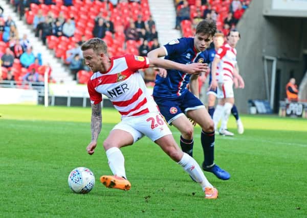 Doncaster Rovers' James Coppinger: Set to return.