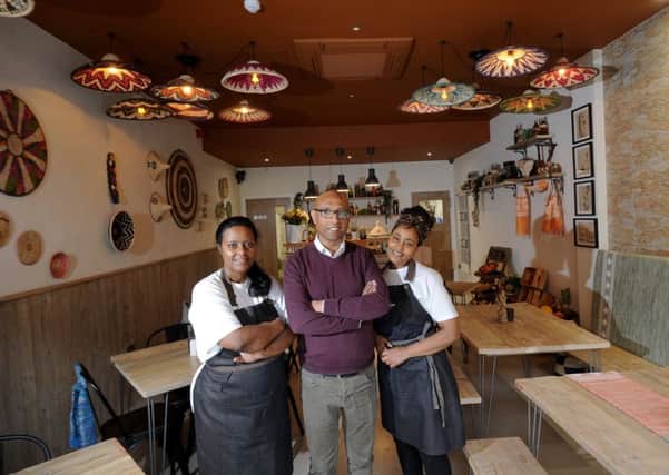Rahel Bein, Asamnew Asres and Bizunesh Kebede, who run the restaurant.