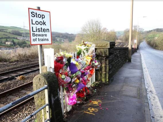 Floral tributes at the crossing where Milena Gagic was killed