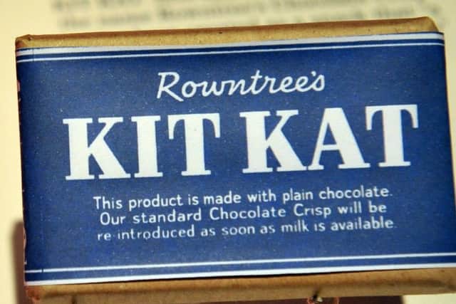 Rowntree's Kit Kat  in  1941 during WW2  had a blue wrapper instead of red