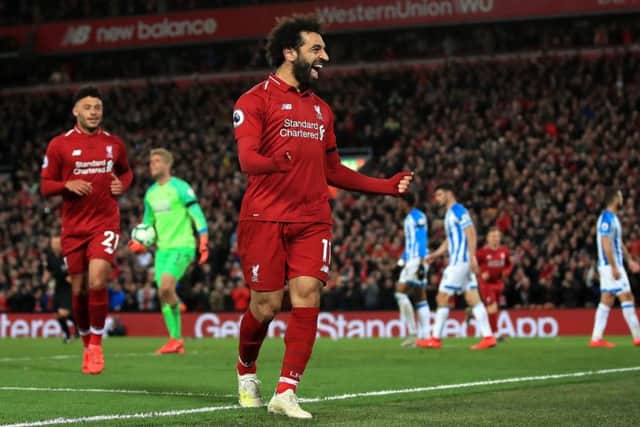Liverpool's Mohamed Salah celebrates scoring his side's fifth goal at Anfield. Picture: Peter Byrne/PA