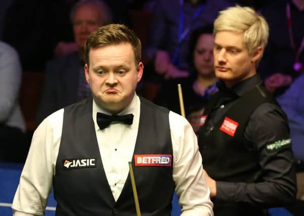 Shaun Murphy (left) and Neil Robertson during day seven of the 2019 Betfred World Championship.