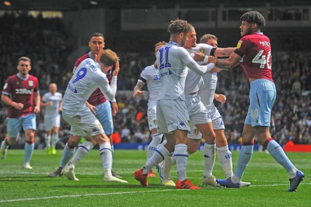 Leeds United's Patrick Bamford falls to ground leading to Aston Villa's Anwar El Ghazi being dismissed despite there having been no contact between the pair (Picture: Tony Johnson).