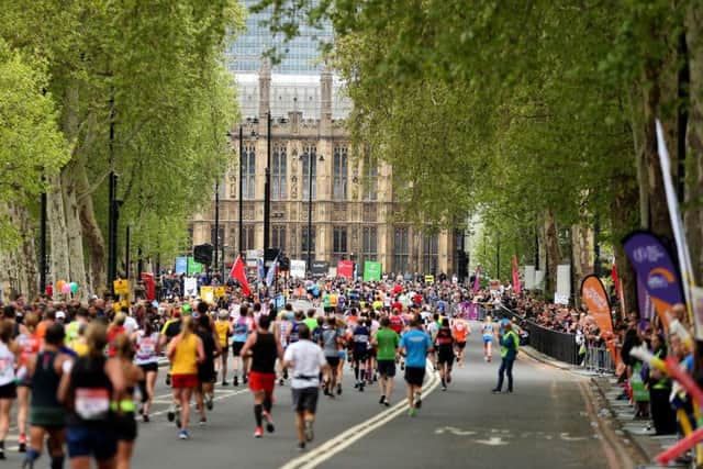 More than 40,000 runners took part in the 2019 London Marathon. Participants pictured here as they pass the Palace of Westminster. Picture by Steven Paston/PA Wire.