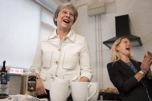 Kim Leadbeater at a social morning with Theresa May to highlight the issue of loneliness.
