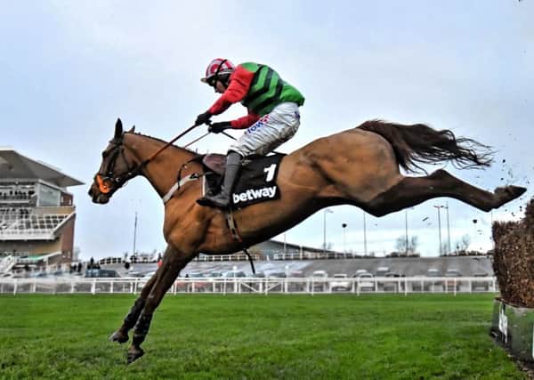 Definitly red and Danny Cook are due to line up in tonight's Punchestown Gold Cup.